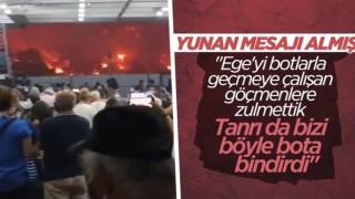 Yunanistan'da alevlerden feribotla kaçanların aklında göçmenler var