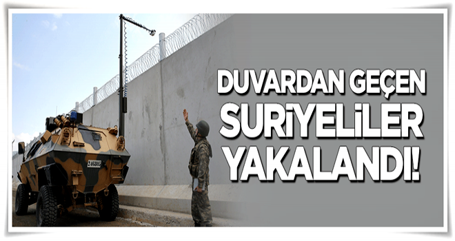 Sınır duvarını merdivenle geçen Suriyeliler yakalandı!